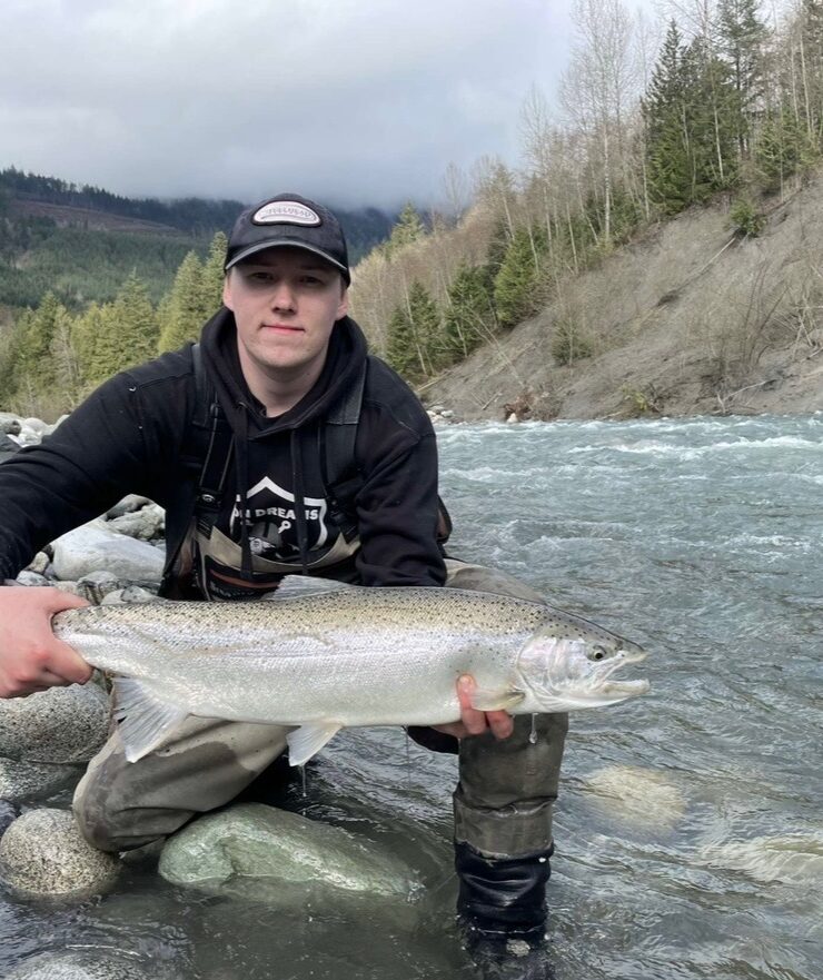 Our guide Marcus Hutchinson holding a fish.