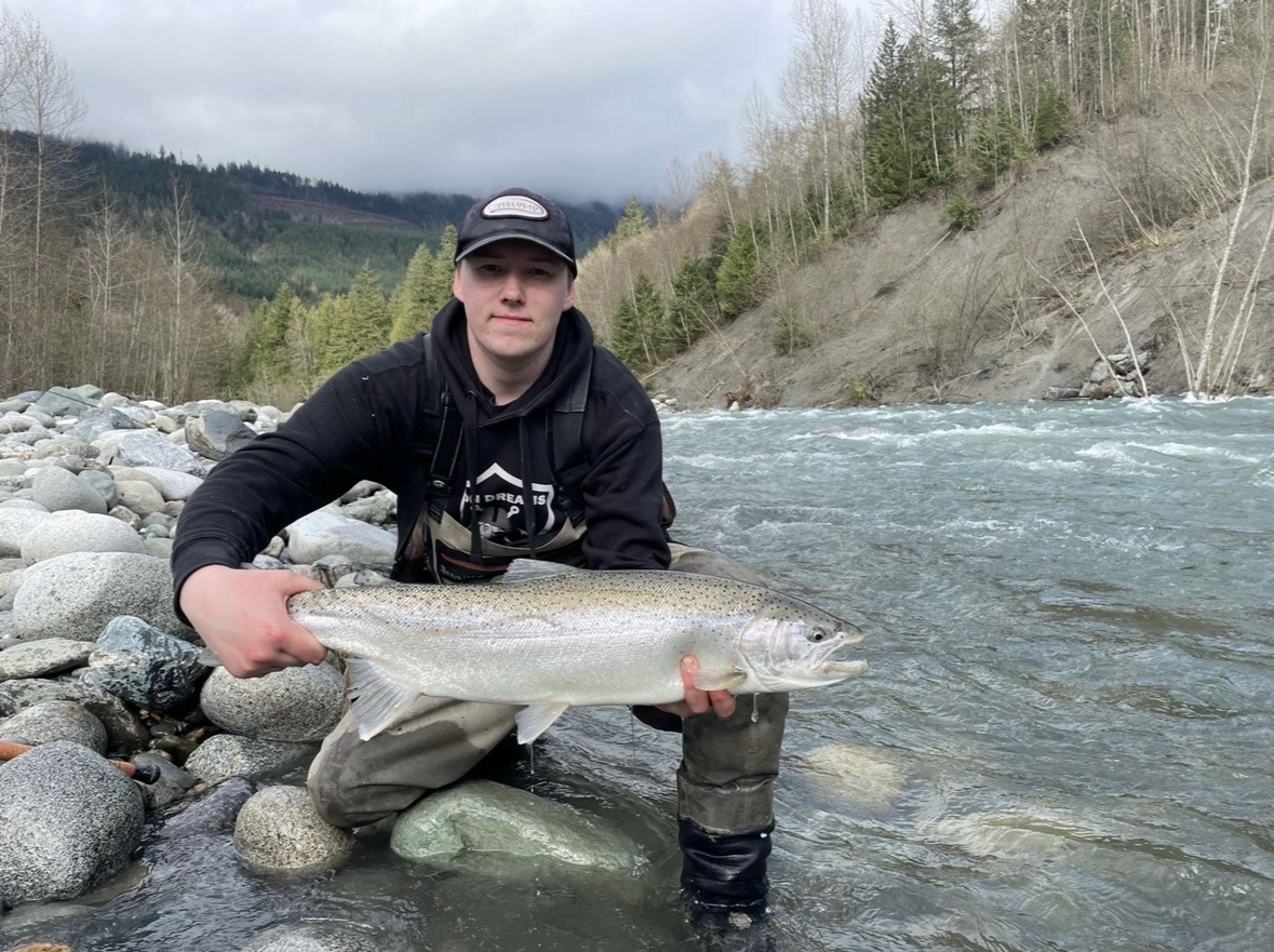 Our guide Marcus Hutchinson holding a fish.